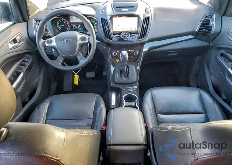 2016 Ford Escape Titanium z USA, uszkodzony, nr VIN 1FMCU9J96GUA76484